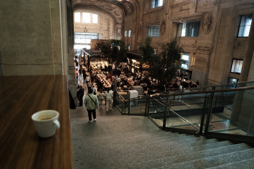 Food counters and communal tables inside the Mercato Centrale food hall