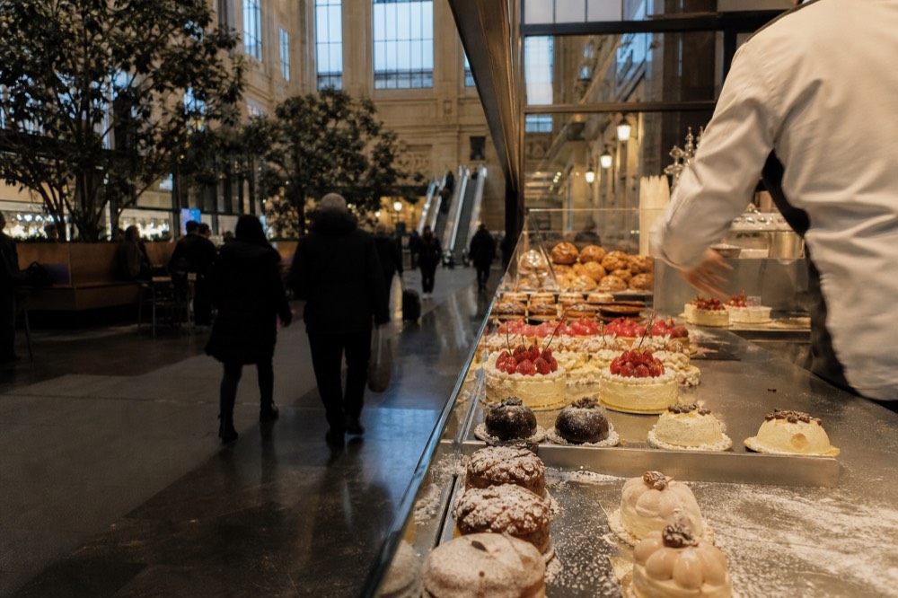 A Milanese pastry shop window displaying seasonal cakes and pastries